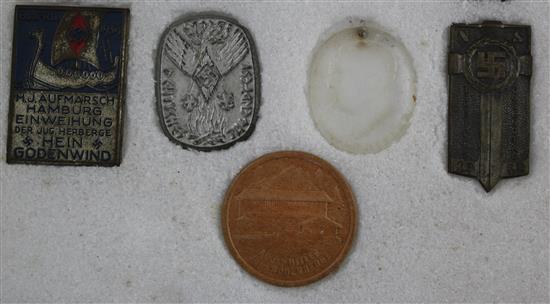 A collection of thirty two Hitler Youth pin badges and other day badges,